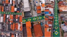 Vizinhos pintam rua inteira em SP com bandeiras do Brasil e mantêm tradição de 11 Copas do Mundo