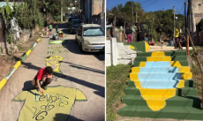 Taça e bandeira do Brasil estampam escadaria pintada por moradores em Porto Alegre